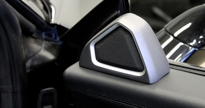 A car audio speaker instillation on the side of a door